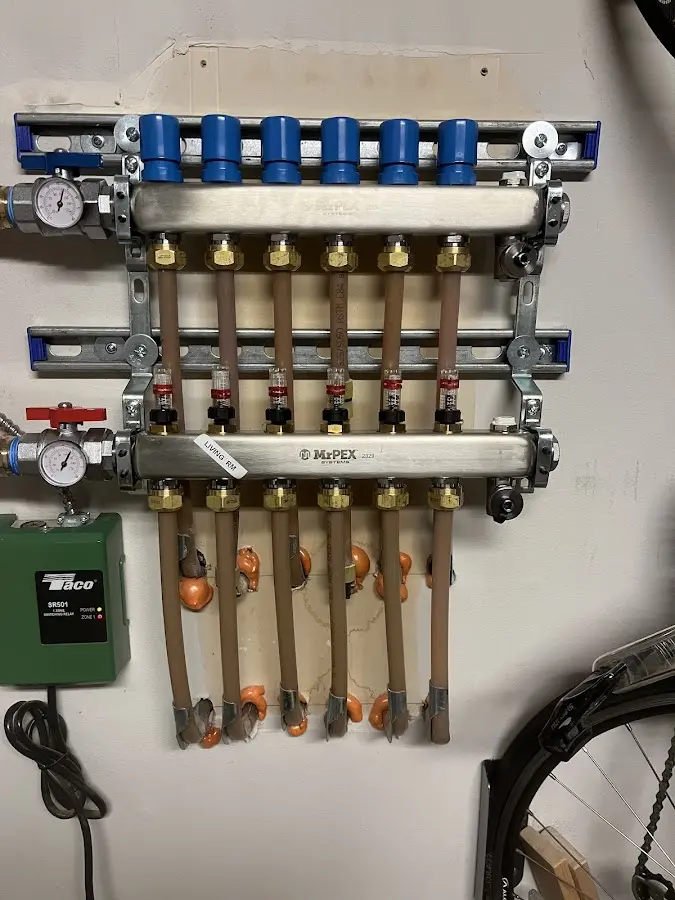 Plumber performing Gas Line Installation at a residential property in Calverton